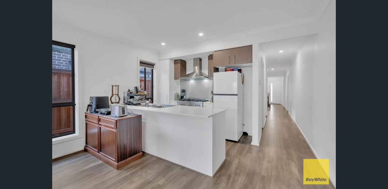 Kitchen — stone benchtops and timber joinery