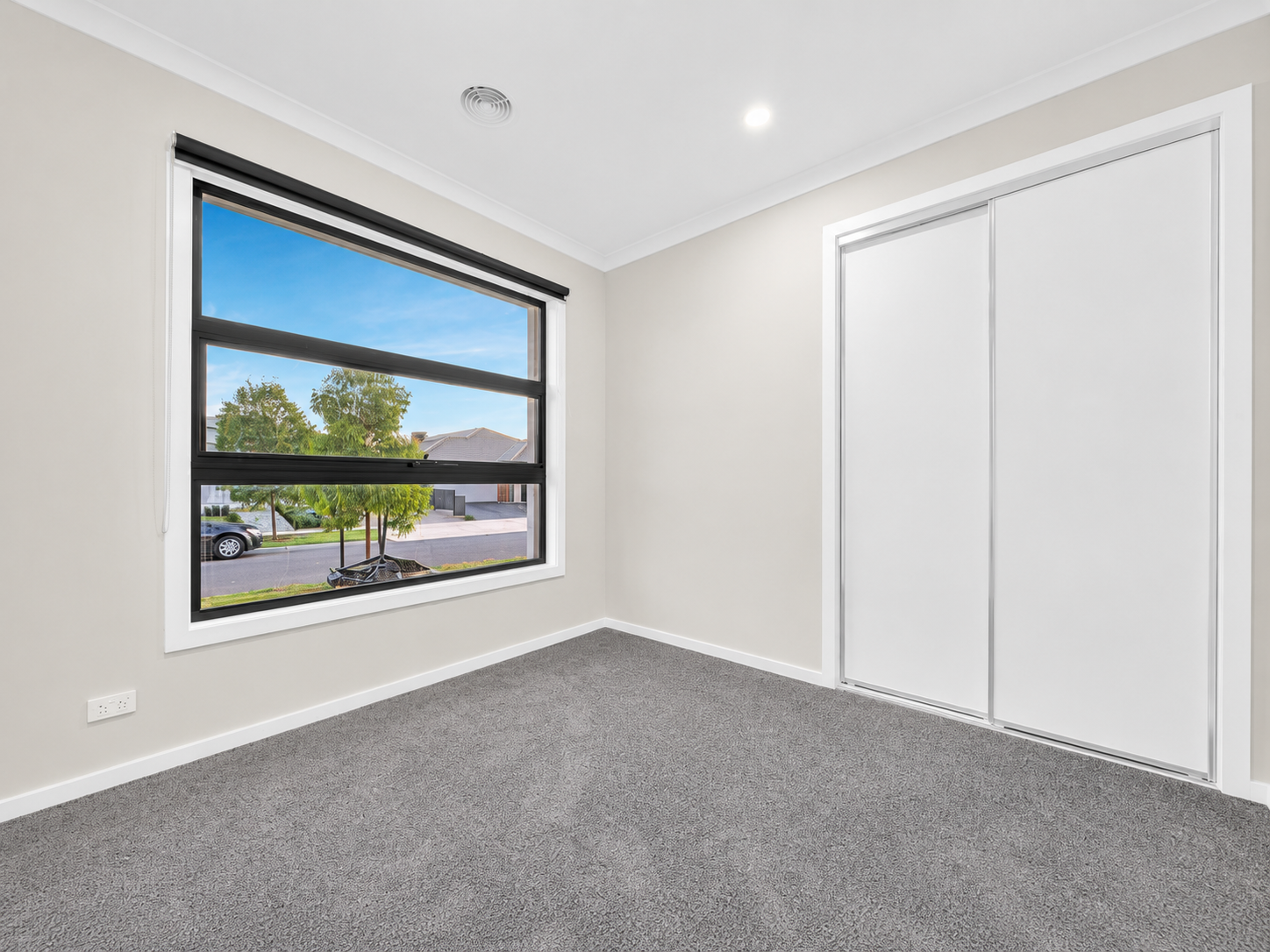 Secondary bedroom with built-in robes