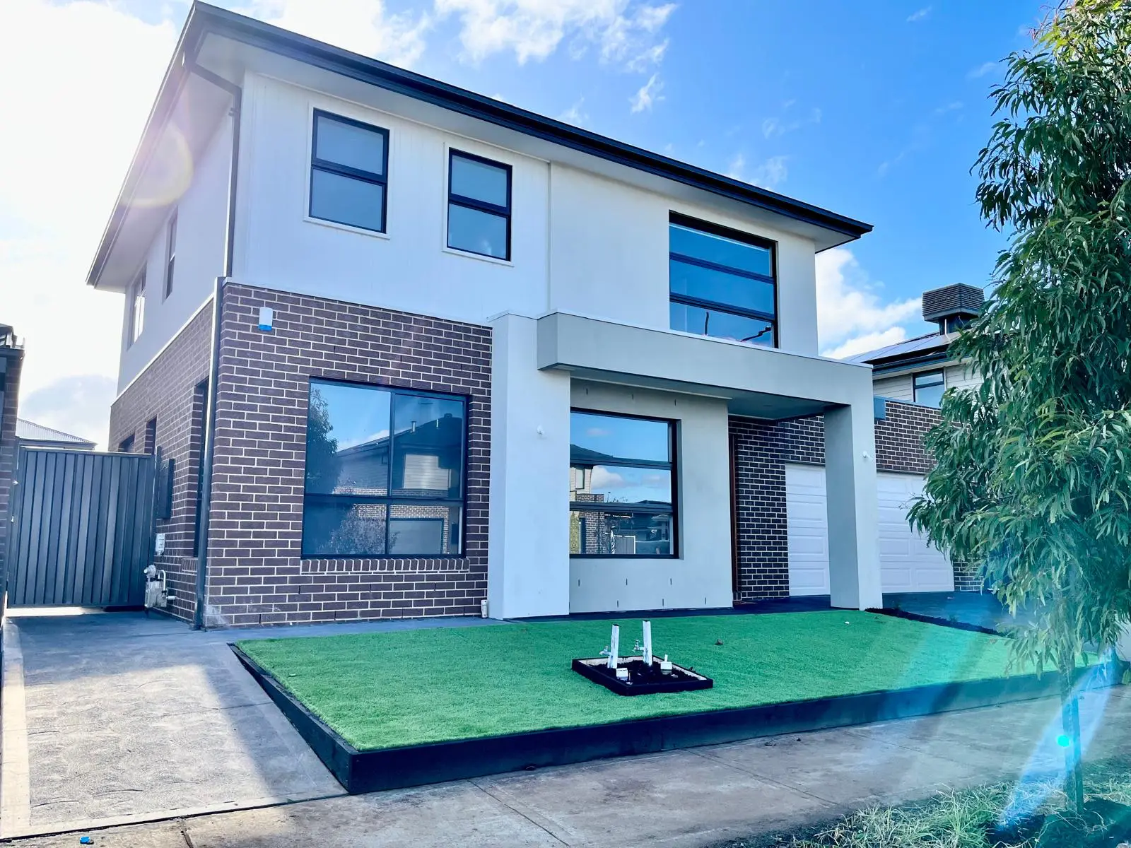 Front elevation and driveway approach at 15 Fairholme Crescent
